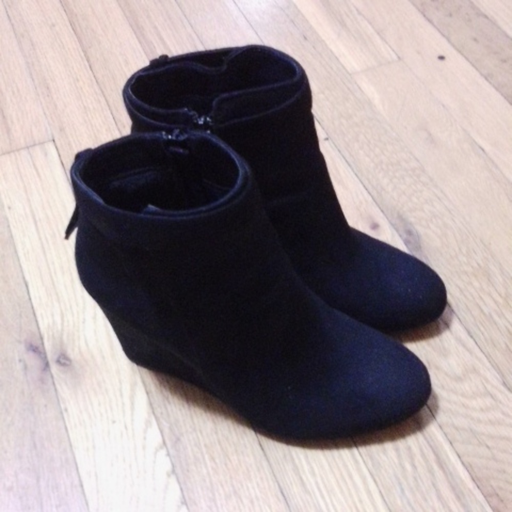 TG size 8 black high heeled ankle boots.